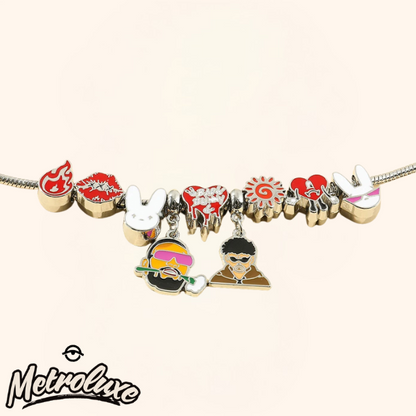 Bracelet with various charms on a white background, featuring the MetroLuxe brand.
